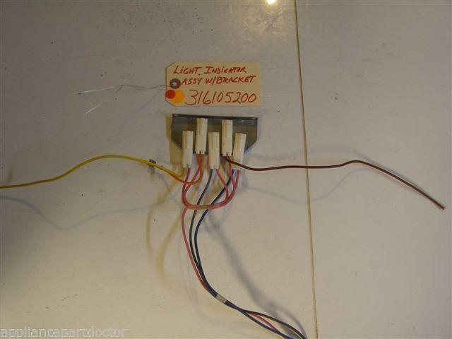 FRIGIDAIRE STOVE 316105200 Light-indicator AssyW/Bracket USED FRIGIDAIRE STOVE 316105200 Light-indicator AssyW/Bracket USED